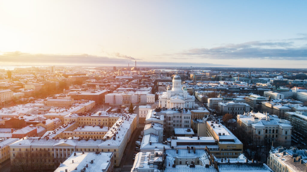 Winter Susnset Scenery Of The Old Town In Helsinki, Finland. Snow On The Roofs. Beautiful Sunlight. Christmas Market. View From Above.